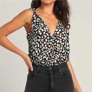 NWOT Free People Bare It All Bodysuit